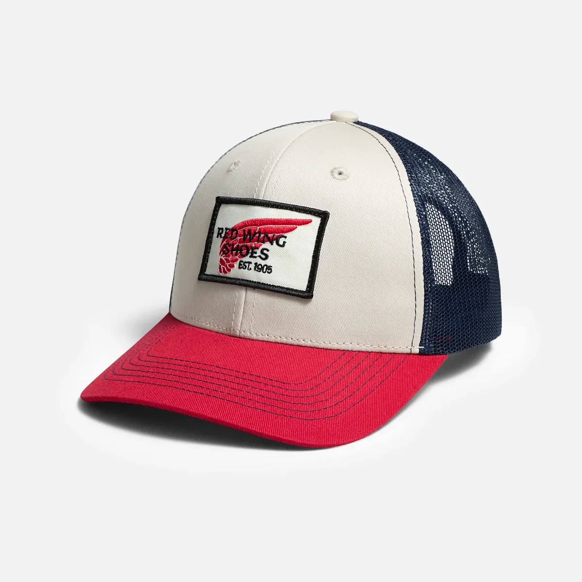 Pro Trucker Cap – Unisex-Baseballkappe in Stone/Rot/Marineblau